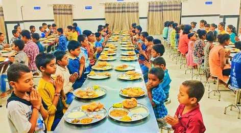 Children sharing a meal together at Balgram